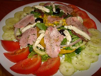 mixed salad with mozzarella cheese and smoked ham